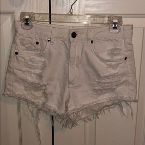 White distressed jean shorts